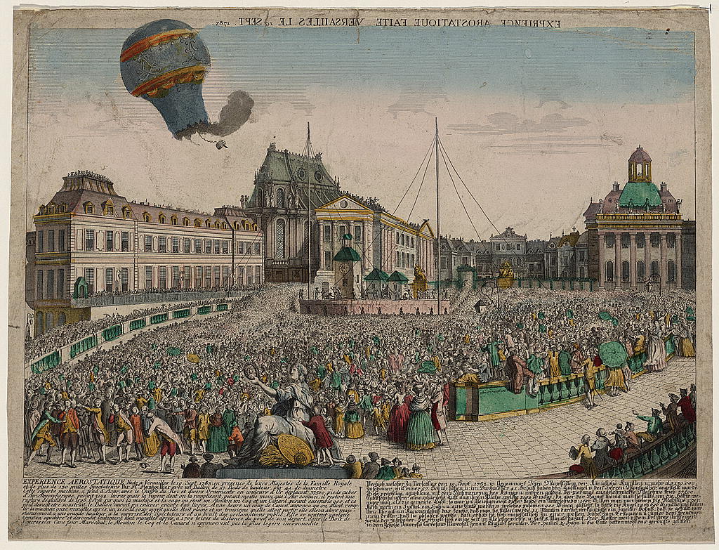 Print with text at bottom showing large crowd gathered outside ground of Palace of Versailles to watch balloon, which is visible rising above the palace.