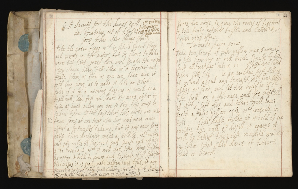 A seventeenth-century recipe book opened to a middle page, with handwriting covering both pages.